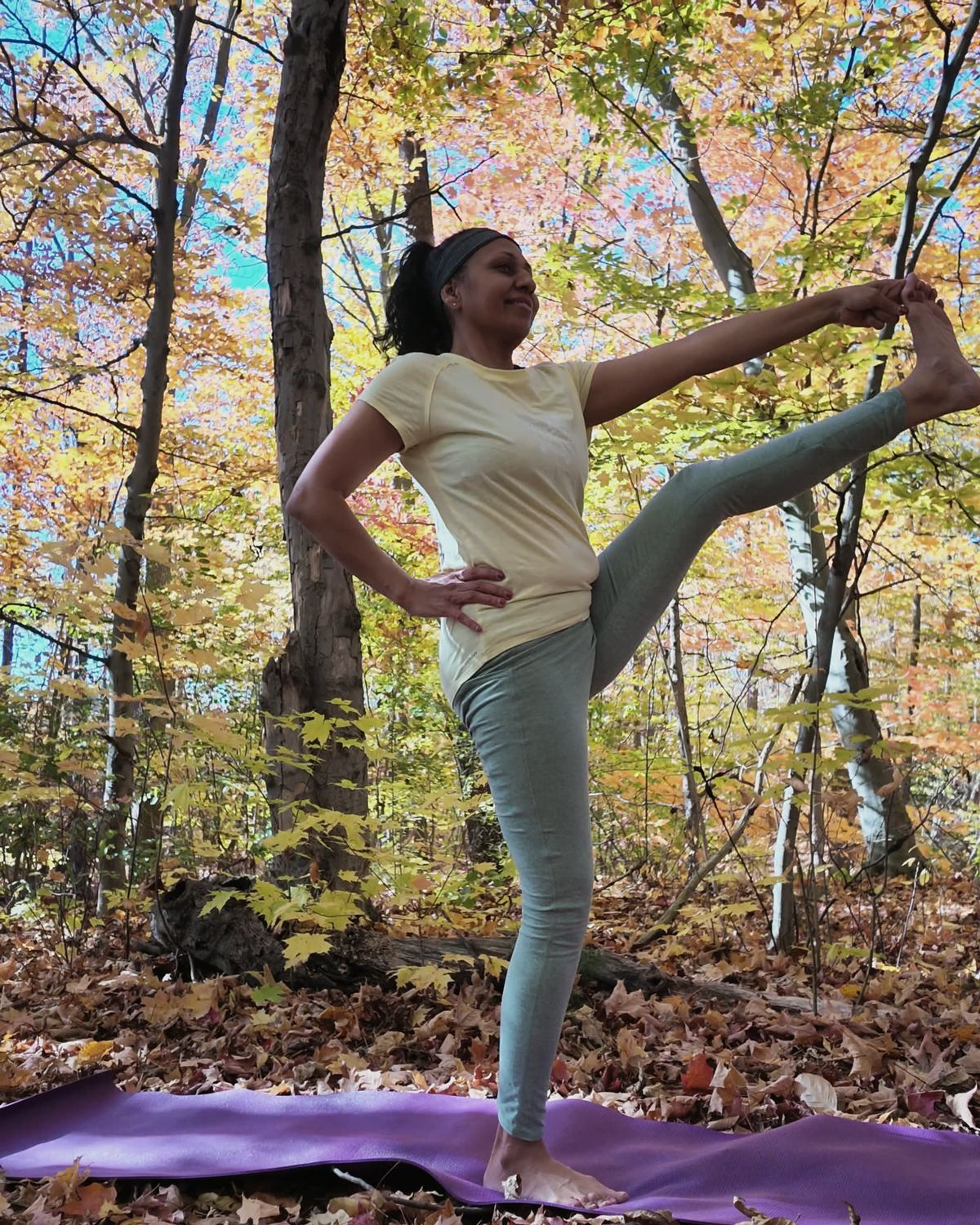 Sneh Lata in a standing hand-to-big-toe hold
