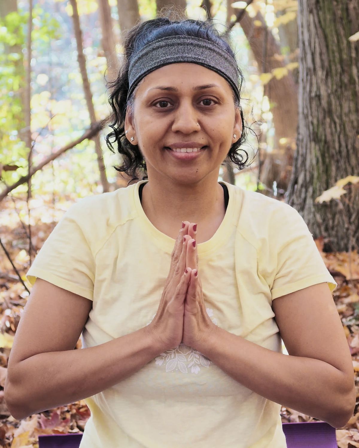 Sneh Lata smiling in namaste
